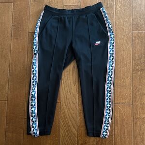 Nike Black Track Joggers with Blue & White Logo Tape